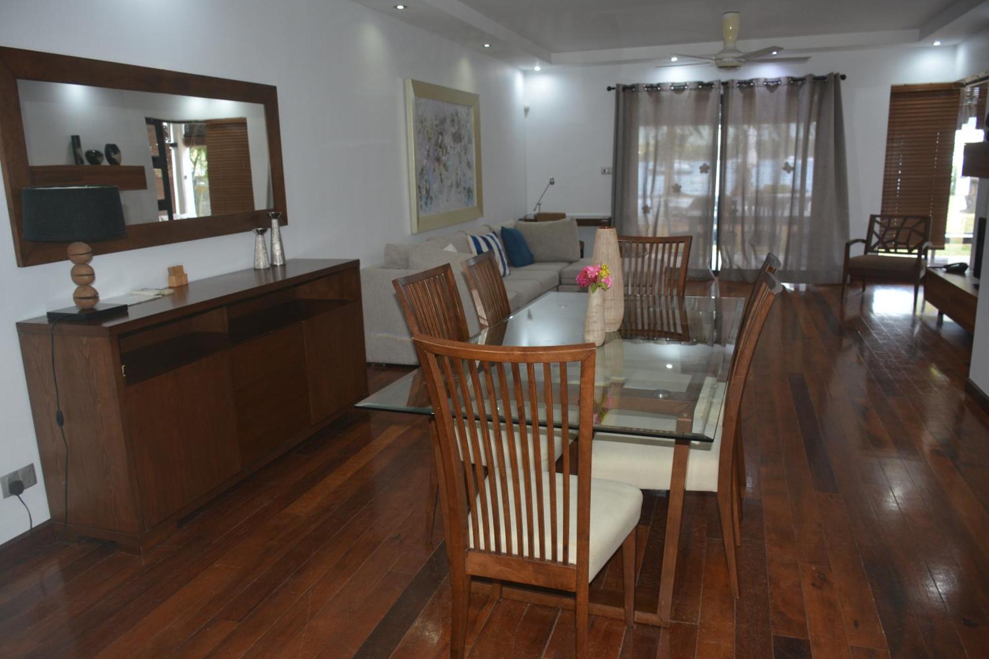 Olana Blue - Beachfront Apartment Rivière Noire Esterno foto