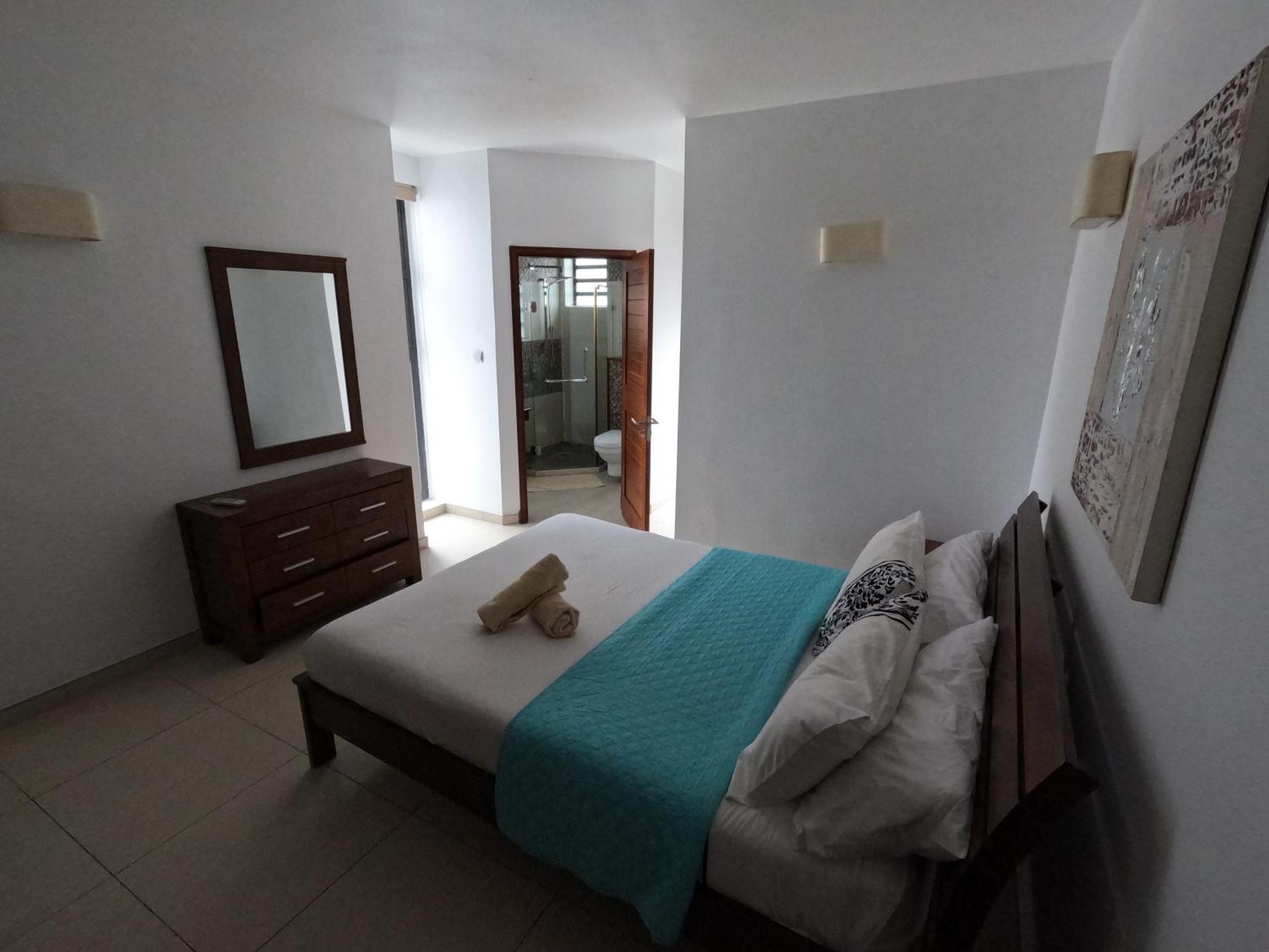 Olana Blue - Beachfront Apartment Rivière Noire Esterno foto